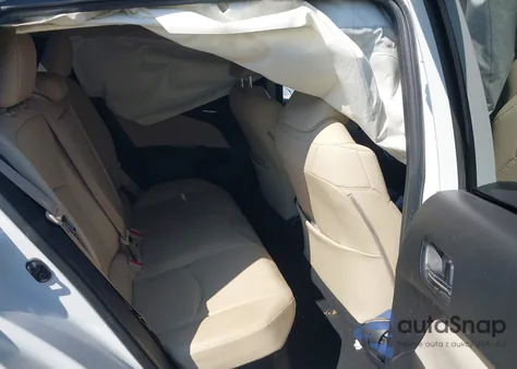 2021 Toyota Prius Xle z USA, uszkodzony, nr VIN JTDKAMFU9M3130578